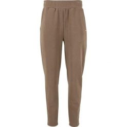 Damskie spodnie dresowe Athlecia Jillnana. Brązowe spodnie dresowe damskie Athlecia, bez wzorów, z dresówki, sportowe, na fitness i siłownię. Za 281.50 zł.