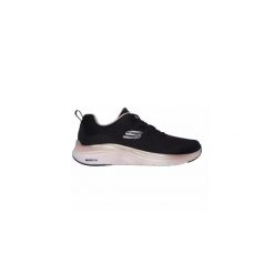 Tenisówki Skechers Model 150025s Kolor Czarny. Czarne trampki i tenisówki damskie Skechers, bez wzorów, z materiału, bez zapięcia. Za 299.99 zł.