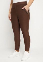 Brązowe Spodnie o Dopasowanym Kroju z Gumką w Talii Stellivae. Brązowe spodnie materiałowe damskie Born2be, bez wzorów, z jeansu, plus size. Za 49.99 zł.