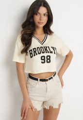 Jasnobeżowy Bawełniany T-shirt z Napisem Nitanelia. Brązowe t-shirty damskie Born2be, m, bez wzorów, z bawełny, bez kołnierzyka, bez ramiączek. Za 29.99 zł.
