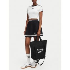 Torebka Reebok. Czarne shopperki damskie Reebok, bez wzorów, bez dodatków. Za 129.99 zł.