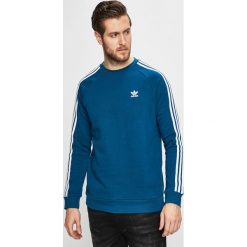 Adidas Originals - Bluza. Niebieskie bluzy męskie adidas Originals, l, z aplikacjami, z bawełny, bez ramiączek, bez kaptura. W wyprzedaży za 159.90 zł.