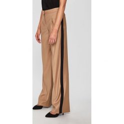 Morgan - Spodnie. Brązowe spodnie materiałowe damskie Morgan, bez wzorów, z elastanu, casualowe. W wyprzedaży za 159.90 zł.