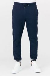 GUESS Granatowe męskie spodnie dresowe. Niebieskie spodnie sportowe męskie Guess, m, z aplikacjami, z bawełny. W wyprzedaży za 199.99 zł.