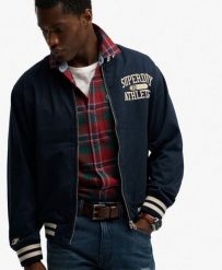 Superdry Kurtka Bomber Twill Varsity z mieszanki bawełny. Niebieskie kurtki męskie Superdry, m, bez wzorów, z bawełny, bez kaptura. Za 304.00 zł.