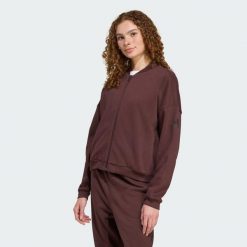 Kurtka Essentials Contemporary Logo Bomber. Czarne kurtki sportowe damskie Adidas, m, bez wzorów, z bawełny, bez ramiączek, bez kaptura. Za 259.00 zł.