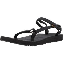 Sandały TEVA W ORIGINAL UNIVERSAL SLIM Czarny. Czarne sandały damskie Teva, bez wzorów, z materiału, bez obcasa, bez zapięcia. Za 350.00 zł.