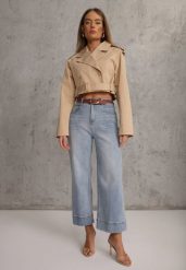 Niebieskie Szerokie Jeansy z Bawełną High Waist Ozdobione Przeszyciami Timolis. Niebieskie jeansy damskie Renee, bez wzorów, z bawełny, z podwyższonym stanem. Za 119.99 zł.