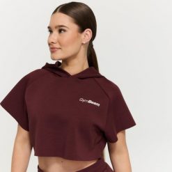 Bluza damska fitness z kapturem Cropped Relay Fig. Fioletowe bluzy damskie GYMBEAM, m, bez wzorów, z bawełny, sportowe, bez ramiączek, z kapturem. Za 125.90 zł.