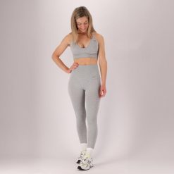 Damski zestaw sportowy - Legginsy/Crop Top - Szary. Szare legginsy damskie Xtreme, s, bez wzorów, z dresówki, krótkie. Za 219.79 zł.
