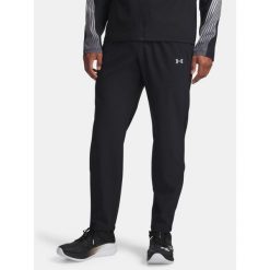 Spodnie do biegania Under Armour Velociti Pro Storm. Czarne spodnie sportowe męskie Under Armour, bez wzorów, do biegania. Za 229.99 zł.