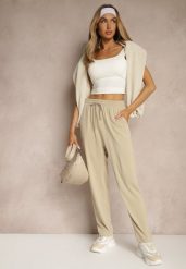 Beżowe Spodnie z Prostą Nogawką i Wiązaniem w Talii Miralira. Brązowe spodnie materiałowe damskie Renee, bez wzorów, z jeansu, eleganckie. Za 39.99 zł.