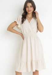 Jasnobeżowa Sukienka Mini z Gumką w Pasie i Falbanką Senait. Brązowe sukienki damskie Born2be, l, bez wzorów, bez kołnierzyka, bez ramiączek, mini. Za 39.99 zł.