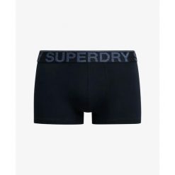 Bokserki z bawełny organicznej Superdry (x3). Niebieskie bokserki męskie Superdry, bez wzorów, z bawełny. W wyprzedaży za 158.20 zł.