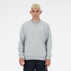 Bluza męska New Balance MT41507AG – szara. Szare bluzy męskie New Balance, l, z aplikacjami, z bawełny, klasyczne, bez ramiączek, bez kaptura. Za 279.99 zł.