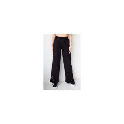 Spodnie dresowe damskie szerokie 2skin I love pilates black. Czarne spodnie dresowe damskie 2SkIN, bez wzorów, z dresówki, sportowe, na fitness i siłownię. Za 259.00 zł.