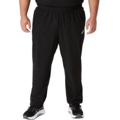 Spodnie dresowe Asics Core woven. Czarne spodnie sportowe męskie Asics, m, bez wzorów, z dresówki, na fitness i siłownię. Za 272.00 zł.