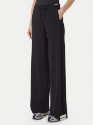 Guess Spodnie dzianinowe V6GB06 Z0651 Czarny Regular Fit. Czarne spodnie materiałowe damskie Guess, z aplikacjami, z dzianiny. Za 524.99 zł.