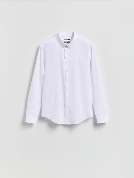 Koszula slim fit - biały. Białe koszule męskie Reserved, l, bez wzorów, z tkaniny, bez kołnierzyka, bez ramiączek. W wyprzedaży za 99.99 zł.