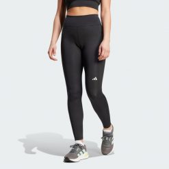 Legginsy Own the Run Winter Full Length. Czarne legginsy damskie Adidas, bez wzorów, z materiału. W wyprzedaży za 226.85 zł.