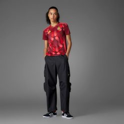 Koszulka piłkarska damska ADIDAS Niemcy 2025 wyjazdowa. Czerwone bluzki damskie Adidas, xl, bez wzorów, z materiału, sportowe, bez kołnierzyka, bez ramiączek. Za 459.99 zł.