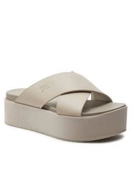 Calvin Klein Jeans Klapki Flatform Cross Mg Uc YW0YW01349 Beżowy. Brązowe klapki damskie Calvin Klein Jeans, bez wzorów, z jeansu, bez obcasa, bez zapięcia. Za 259.99 zł.