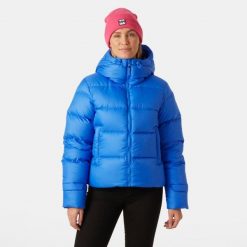 Damska kurtka z kapturem Helly Hansen Essence. Niebieskie kurtki sportowe damskie Helly Hansen, xl, bez wzorów, z materiału, bez ramiączek, z kapturem, trekkingowe. Za 625.60 zł.