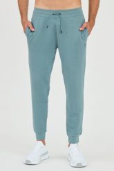 GUESS Patynowe spodnie dresowe. Zielone spodnie sportowe męskie Guess, m, z aplikacjami, z dresówki. W wyprzedaży za 229.99 zł.