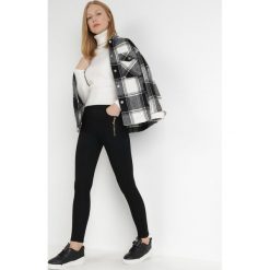Czarne Legginsy Amiata. Czarne legginsy damskie Born2be, bez wzorów, z dzianiny. Za 34.99 zł.