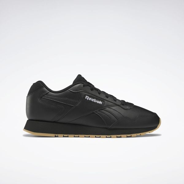 Trampki Męskie Skóra Glide. Czarne trampki męskie Reebok, bez wzorów, z gumy, bez zapięcia. Za 189.00 zł.