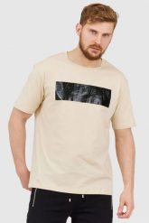 BALMAIN Beżowy t-shirt męski z aplikacją z logo. Brązowe t-shirty męskie Balmain, m, z aplikacjami, prążkowane, bez kołnierzyka, bez ramiączek. W wyprzedaży za 1,299.99 zł.