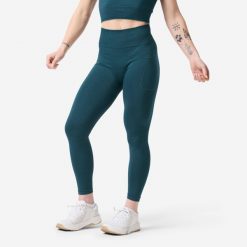 Legginsy do treningu siłowego damskie Domyos bezszwowe. Niebieskie legginsy damskie DOMYOS, bez wzorów, z dzianiny. Za 99.99 zł.