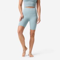 Legginsy krótkie do jogi i pilatesu Domyos. Niebieskie legginsy damskie DOMYOS, bez wzorów, z materiału. Za 69.99 zł.