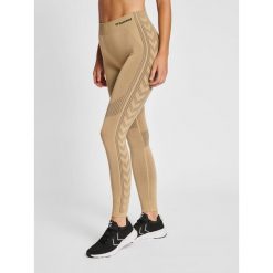 Damskie legginsy mid-rise Hummel Shaping. Brązowe legginsy damskie Hummel, bez wzorów. Za 138.50 zł.