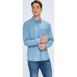 Tommy Jeans - Koszula. Niebieskie koszule męskie Tommy Jeans, m, bez wzorów, z bawełny, casualowe, bez kołnierzyka, bez ramiączek. W wyprzedaży za 239.90 zł.