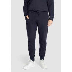 Spodnie Mężczyzna NAPAPIJRI MALIS. Niebieskie spodnie sportowe męskie Napapijri, m, bez wzorów. Za 332.15 zł.