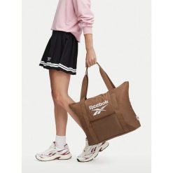 Torebka Reebok. Brązowe shopperki damskie Reebok, bez wzorów, bez dodatków. Za 79.99 zł.