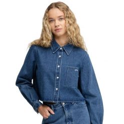 Damska koszula dżinsowa crop top Siroko Nimes-W Blue. Niebieskie koszule damskie SIROKO, bez wzorów, z bawełny, klasyczne, bez kołnierzyka, bez ramiączek. Za 211.00 zł.