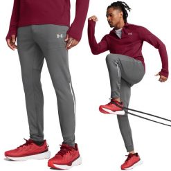 Spodnie treningowe męskie Under Armour wygodne dresowe do ćwiczeń. Szare spodnie sportowe męskie Under Armour, m, bez wzorów, z dresówki, trekkingowe. Za 229.99 zł.