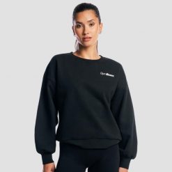 Bluza damska fitness oversize czarna Base. Czarne bluzy damskie GYMBEAM, m, bez wzorów, z bawełny, bez ramiączek, bez kaptura. Za 127.90 zł.
