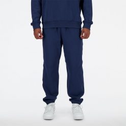 Spodnie męskie New Balance MP41508NNY – granatowe. Niebieskie spodnie sportowe męskie New Balance, m, bez wzorów, z bawełny. Za 359.99 zł.