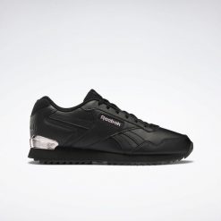 Trampki Damskie Drobne Fale Glide. Czarne trampki i tenisówki damskie Reebok, bez wzorów, z gumy, bez zapięcia. Za 244.30 zł.