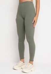 Ciemnozielone Legginsy z Gumką w Pasie z Regularnym Stanem Timalanie. Zielone legginsy damskie Born2be, bez wzorów, z dzianiny. Za 19.99 zł.
