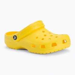 Klapki Crocs Classic. Żółte klapki damskie Crocs, bez wzorów, bez obcasa, bez zapięcia. Za 89.99 zł.