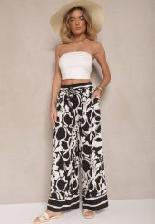 Czarne Spodnie o Szerokim Kroju High Waist w Kwiaty Nelrive. Czarne spodnie materiałowe damskie Renee, z aplikacjami, z jeansu, eleganckie, z podwyższonym stanem. Za 44.99 zł.