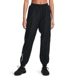 Spodnie dresowe damskie Under Armour Rush Woven Pant. Czarne spodnie dresowe damskie Under Armour, bez wzorów, z dresówki, sportowe, trekkingowe. Za 199.99 zł.