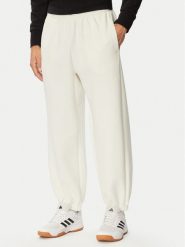 Adidas Spodnie dresowe Soft Lux KF8574 Kremowy Regular Fit. Białe spodnie sportowe męskie Adidas, m, bez wzorów, z dresówki. Za 281.99 zł.