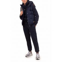 Kurtka bez rękawów z kapturem Superdry Everst. Niebieskie kurtki męskie Superdry, m, bez wzorów, z puchu, z kapturem. W wyprzedaży za 474.20 zł.