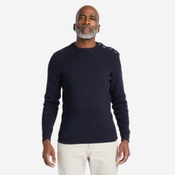 Sweter marynarski męski Tribord. Niebieskie swetry męskie Decathlon, l, bez wzorów, z bawełny, eleganckie, bez kołnierzyka, bez ramiączek. Za 79.99 zł.