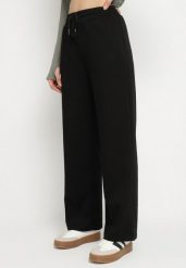 Czarne Spodnie Dresowe Szerokie z Wiskozą Elaniris. Czarne spodnie dresowe damskie Born2be, bez wzorów, z dresówki, eleganckie. Za 39.99 zł.